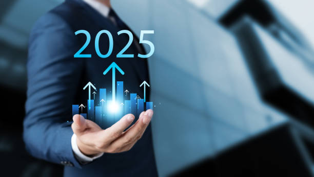 What is a Ecommerce Website? - Set business goals for 2025, businessman holds up arrow charging graph Show business growth with text 2025, implementation of business goals plan, development to achieve prosperity and success.